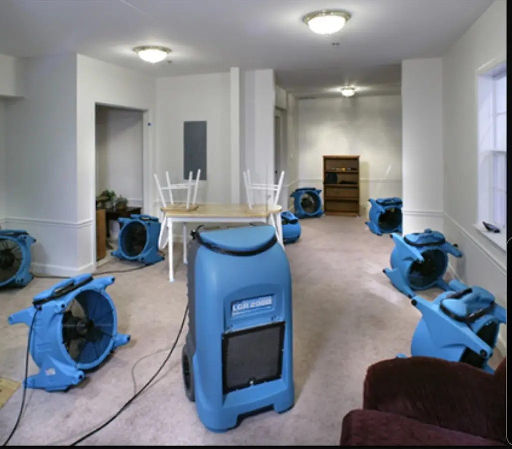 Air movers and dehumidifier setup for Water Extraction & Removal in Davis